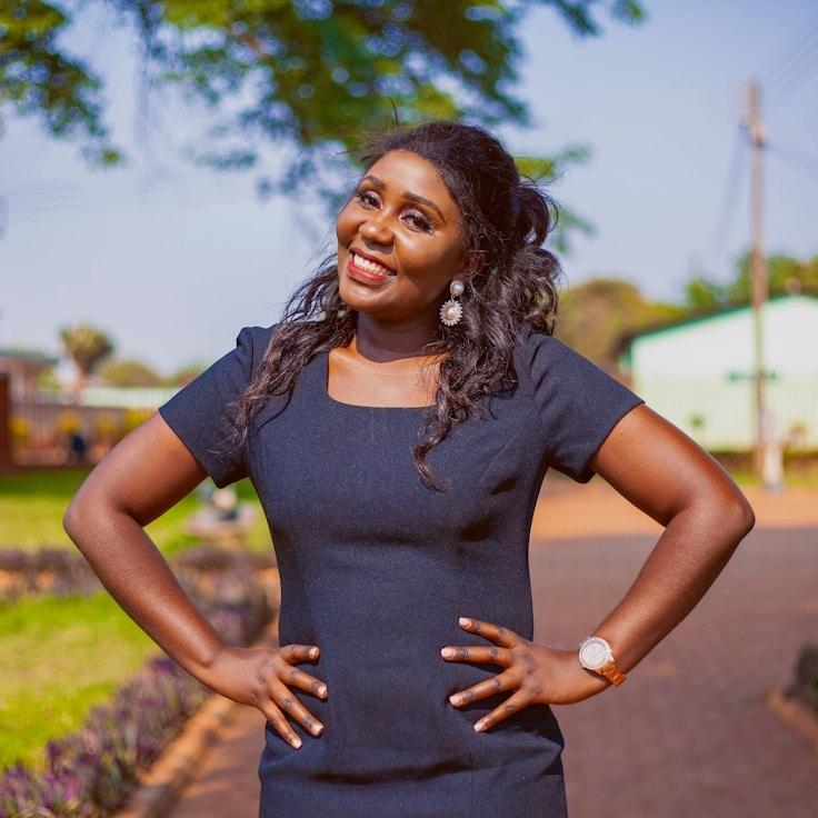 Kaveri Mehta, Lead Design Curator at OrchardGentleSilent, reviewing corporate floral arrangements